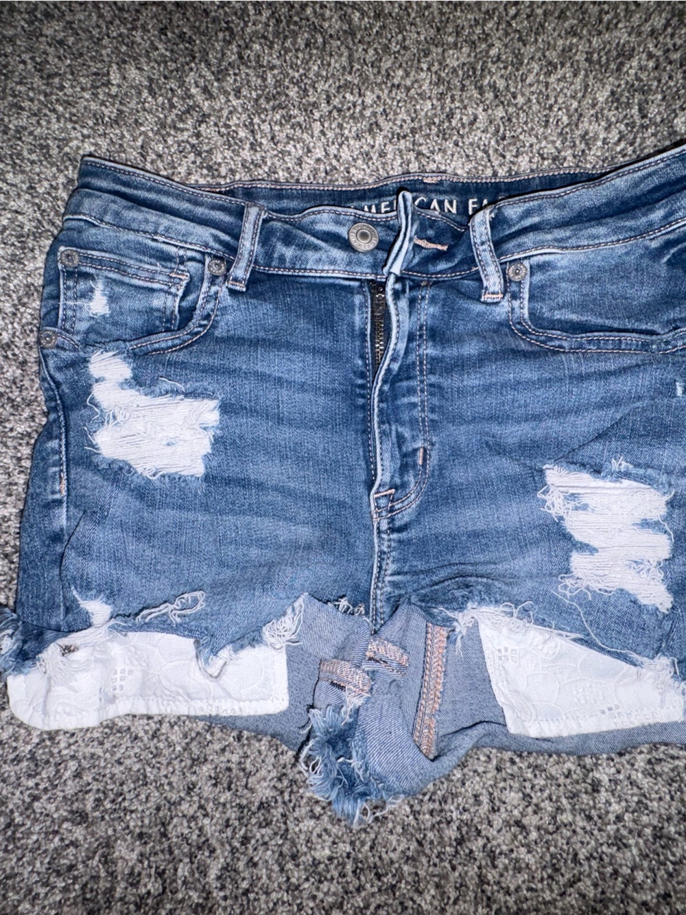Distressed Blue Women’s High-Waist Jeans